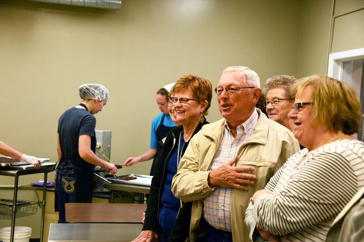 065 D. and D. Regier, B. Franz, D. Figgner at the chocolate factory in Kalona.JPG